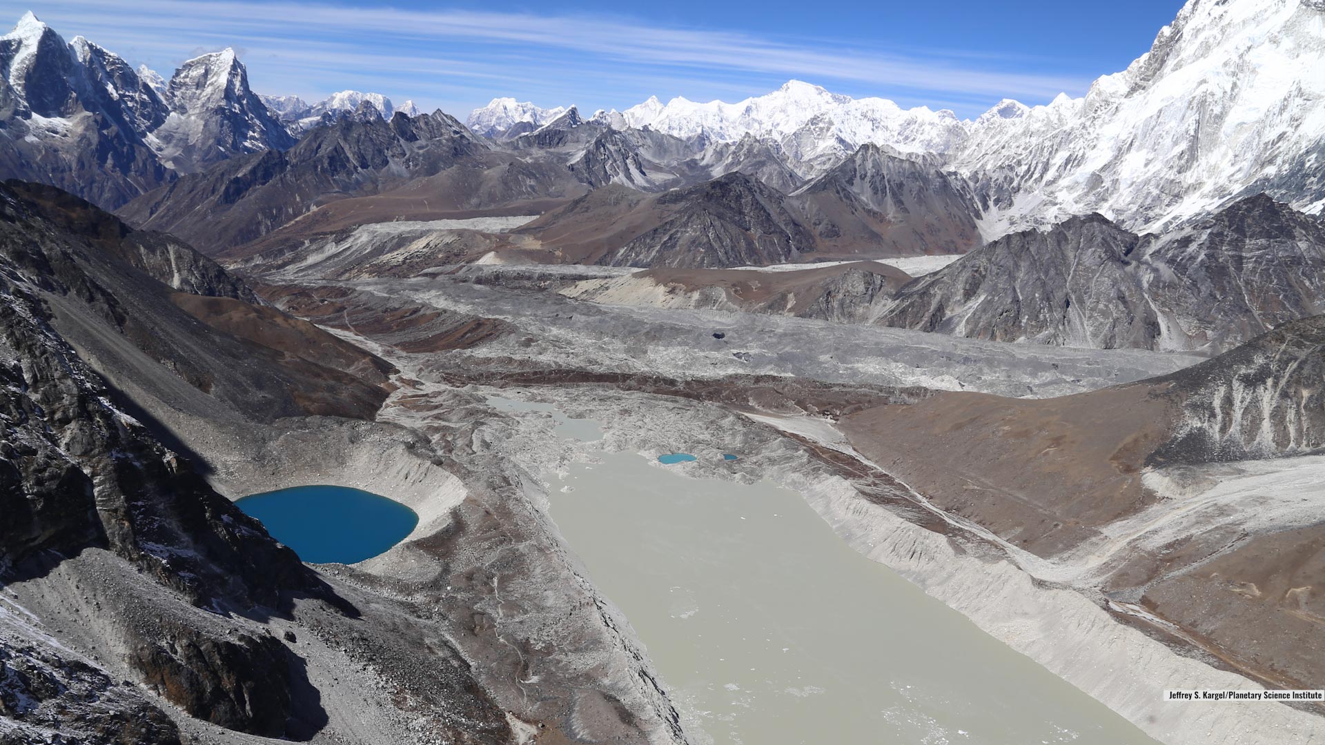Aerial view of Imja Glacial Lake in Nepal, highlighting the threat it poses to downstream communities.